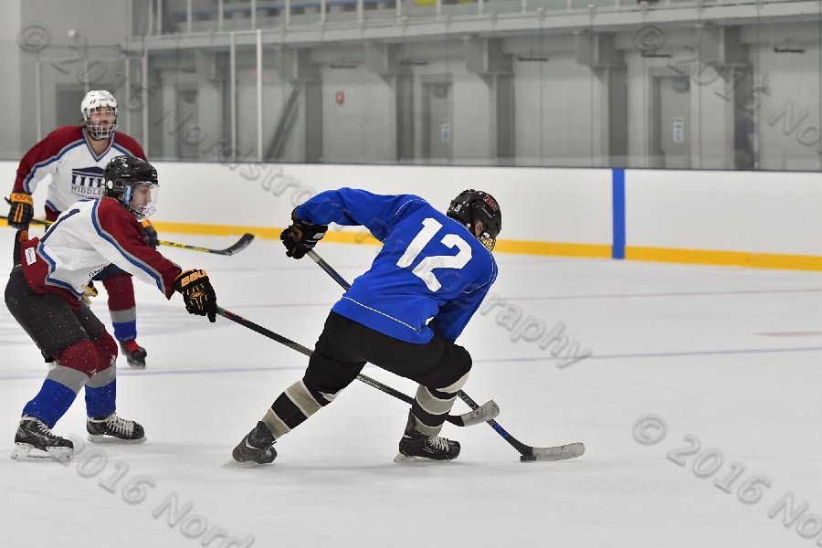 Wheaton College Men\'s Ice Hockey vs Middlesex Community College. - Photo By: KEITH NORDSTROM